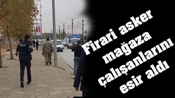 Firari asker  mağaza çalışanlarını esir aldı.